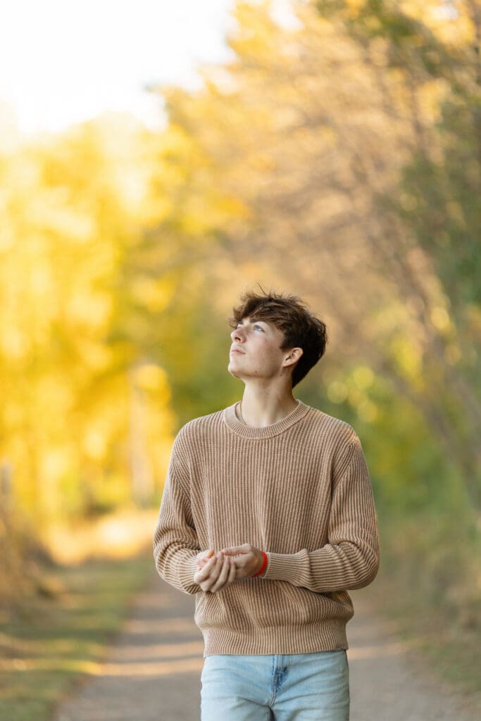 senior guy walking on trail